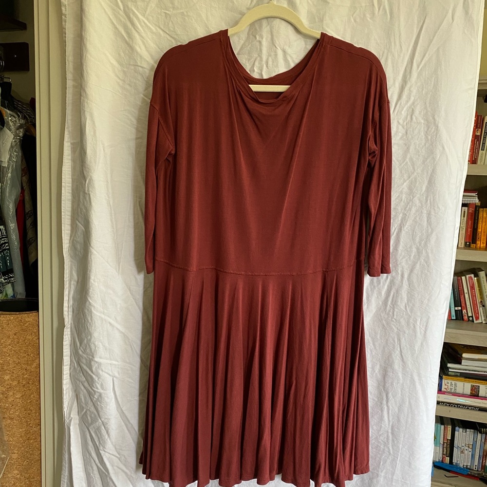 Rust colored light weight Free People tunic size XS.